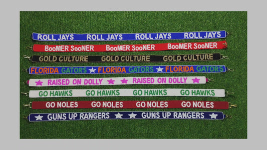 Beaded Purse Strap – "Roll Jays," "Boomer Sooner," "Gold Culture," "Florida Gators," "Raised on Dolly," "Go Hawks," "Go Noles," and "Guns Up Rangers!"